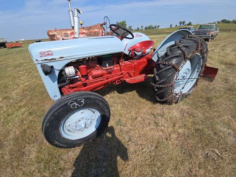 FORD 8N OR 9N TRACTOR WITH 3PT BLADE. GAS. RUNS GREAT! MOSTLY GOOD SHEET METAL.