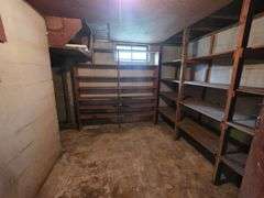 7 +/- Acres Home with Outbuildings