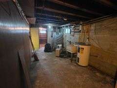 7 +/- Acres Home with Outbuildings