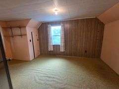 7 +/- Acres Home with Outbuildings