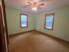7 +/- Acres Home with Outbuildings
