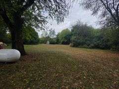 7 +/- Acres Home with Outbuildings