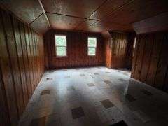 7 +/- Acres Home with Outbuildings