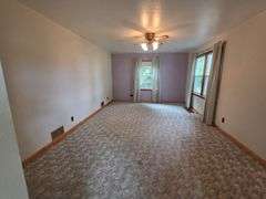 7 +/- Acres Home with Outbuildings