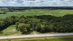 7 +/- Acres Home with Outbuildings