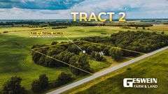 7 +/- Acres Home with Outbuildings
