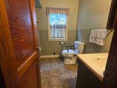7 +/- Acres Home with Outbuildings