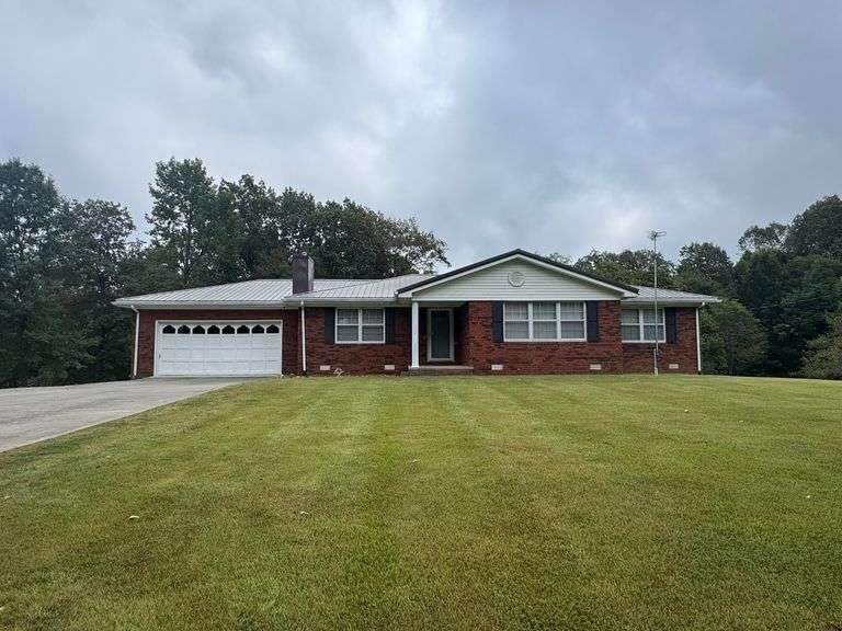 HOME ON 3.32 ACRES IN LOWES KY