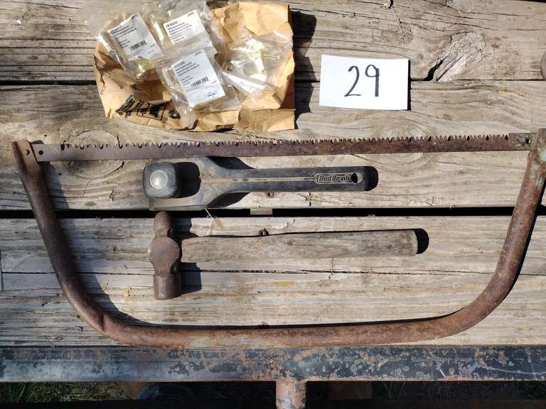 Handrail brackets, ball peen hammer, bow saw, Red devil hand sander.