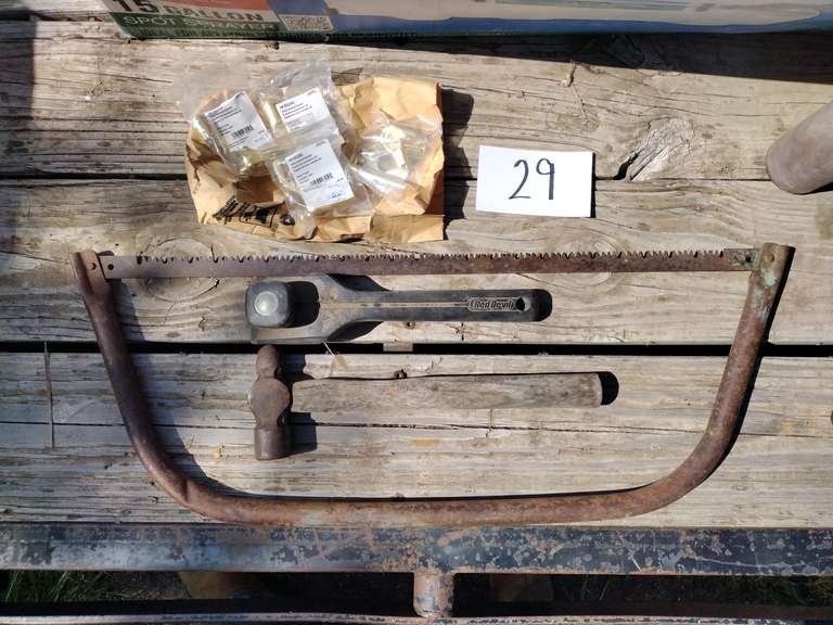Handrail brackets, ball peen hammer, bow saw, Red devil hand sander.