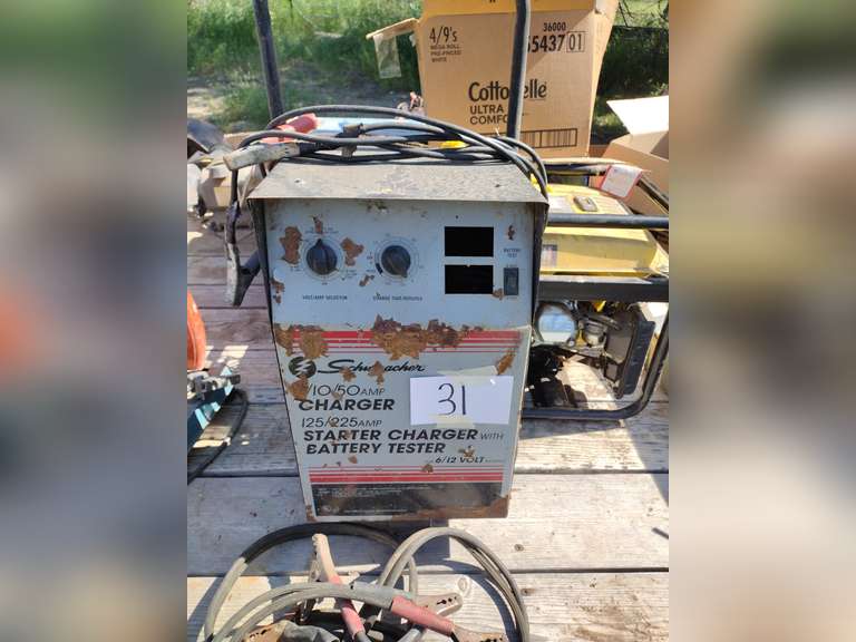 Schumacher 125/225 amp starter battery charger with automotive jumper cables ￼