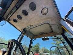 2001 New Holland TS110 4WD Enclosed Cab Tractor (3,612 Hours)