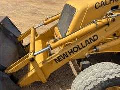 1999 New Holland 555E Backhoe/Loader (4,585 Hours)