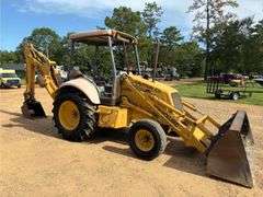 1999 New Holland 555E Backhoe/Loader (4,585 Hours)