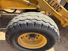 1999 New Holland 555E Backhoe/Loader (4,585 Hours)