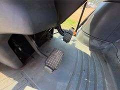 2001 New Holland TS110 4WD Enclosed Cab Tractor (3,612 Hours)
