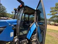 2001 New Holland TS110 4WD Enclosed Cab Tractor (3,612 Hours)