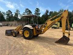 1999 New Holland 555E Backhoe/Loader (4,585 Hours)