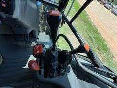 2001 New Holland TS110 4WD Enclosed Cab Tractor (3,612 Hours)