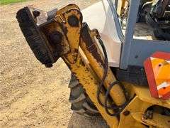 1999 New Holland 555E Backhoe/Loader (4,585 Hours)