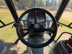 2001 New Holland TS110 4WD Enclosed Cab Tractor (3,612 Hours)