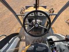 1999 New Holland 555E Backhoe/Loader (4,585 Hours)