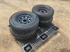 (4) Radial CastleRock ST205/75 R15 Tires with Rims