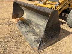 1999 New Holland 555E Backhoe/Loader (4,585 Hours)