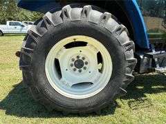 2001 New Holland TS110 4WD Enclosed Cab Tractor (3,612 Hours)