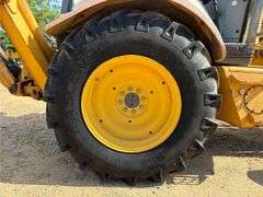 1999 New Holland 555E Backhoe/Loader (4,585 Hours)