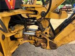 1999 New Holland 555E Backhoe/Loader (4,585 Hours)