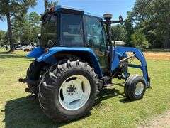 2001 New Holland TS110 4WD Enclosed Cab Tractor (3,612 Hours)