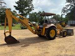 1999 New Holland 555E Backhoe/Loader (4,585 Hours)