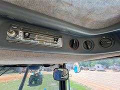 2001 New Holland TS110 4WD Enclosed Cab Tractor (3,612 Hours)