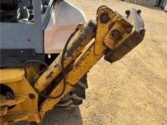 1999 New Holland 555E Backhoe/Loader (4,585 Hours)