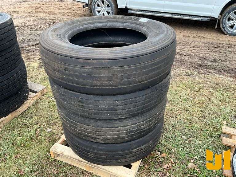 (3) 11R22.5 TIRES, (1) 285/75R24.5 TIRE