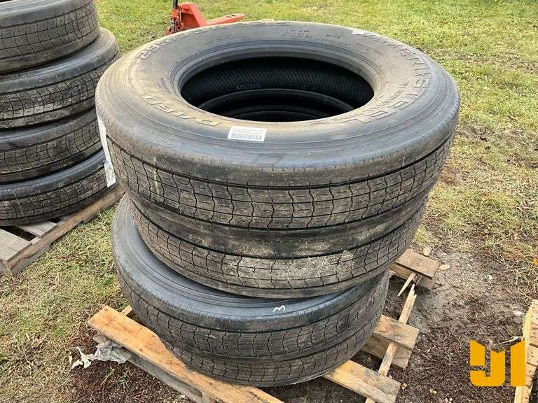 (4) 295/75R22.5 TIRES