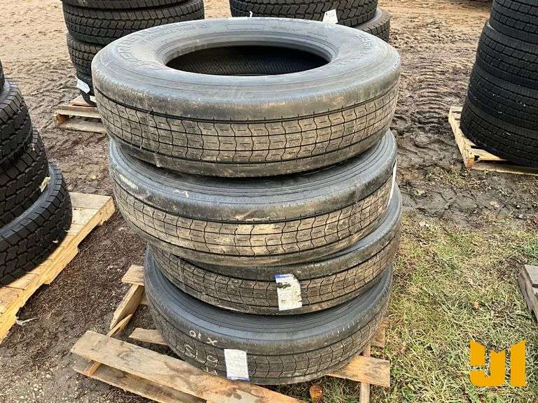 (4) 295/75R22.5 TIRES