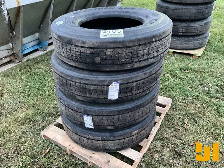 (4) 295/75R22.5 TIRES, (2) HAVE WHEELS