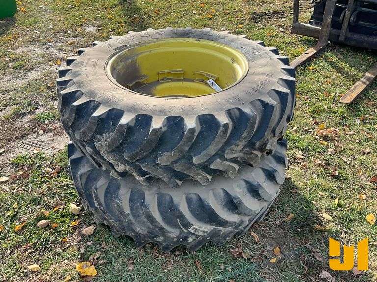 (2) FIRESTONE 14.9R30 TIRES ON RIMS