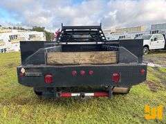 2011 CHEVROLET SILVERADO SINGLE AXLE CREW CAB 4X4 FLATBED TRUCK VIN: 1GB4KZCL7BF235859