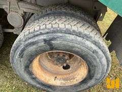 1998 VOLVO WG64 TANDEM AXLE DUMP TRUCK VIN: 4VHJCCFD7WN860211