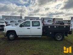 2011 CHEVROLET SILVERADO SINGLE AXLE CREW CAB 4X4 FLATBED TRUCK VIN: 1GB4KZCL7BF235859