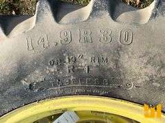 (2) FIRESTONE 14.9R30 TIRES ON RIMS
