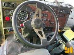 2003 KENWORTH T800 TRI-AXLE DUMP TRUCK VIN: 1NKDXUEXX3J383453