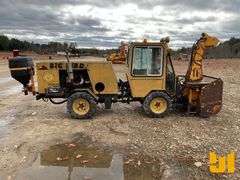 TRACKLESS VEHICLES SIDE WALK MACHINE