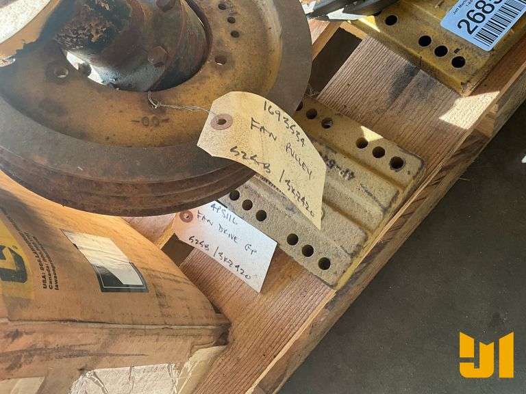 PALLET OF MISC PARTS INCLUDING FLYWHEEL, 2 STARTERS, 2 ALTERNATORS,