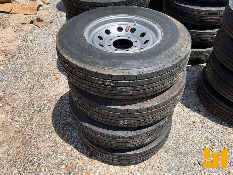(4) NEW 235/80R16 TIRES 8 LUG RIMS - Jeff Martin Auctioneers, Inc.