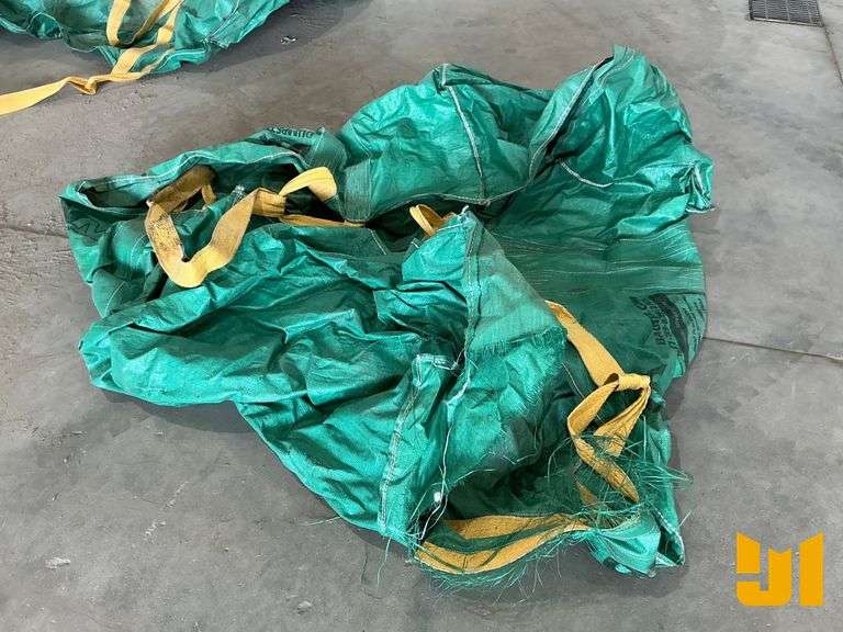 (2) PALLETS OF CARDBOARD FLATS, (3) WASTE MANAGEMENT DUMPSTER BAGS