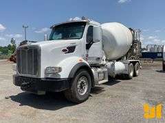 2018 PETERBILT 567 TANDEM AXLE REAR DISCHARGE MIXER TRUCK VIN: 1NPCL70XXJD466029